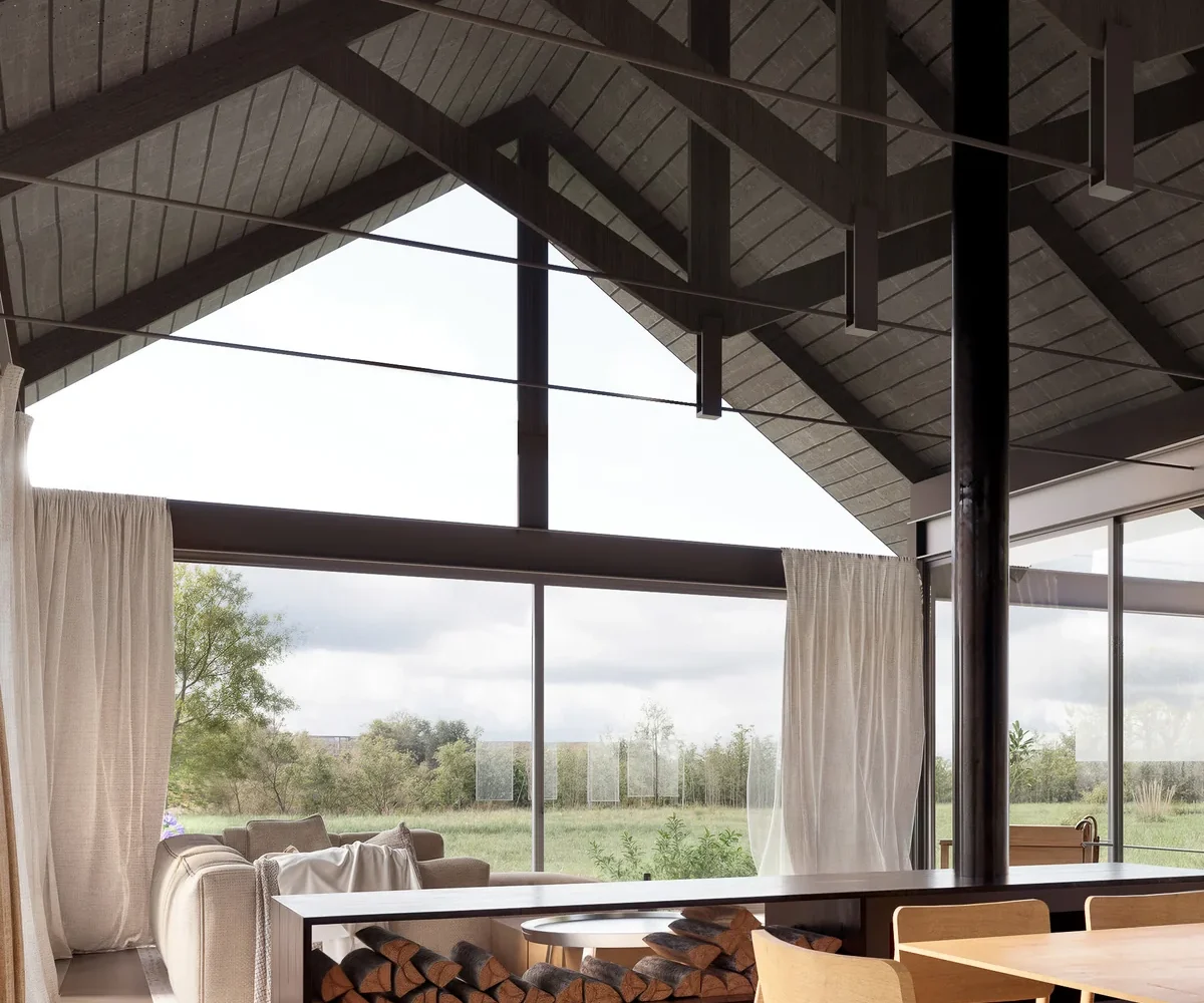 Living comedor bajo las cerchas de madera, con leñera y ventanal al campo
